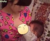 Beautiful asian young mom breastfeeding from young breastfeeding