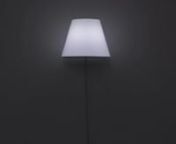 A lamp that is floating in the air. Inside the lampshade there i s a unit of 2 motors to movenitself irregularly and LED. It is fixed to the wall with a pole behind it. The whole room willnmove slightly when light moves.nnDesign : YOYhttp://yoy-idea.jpnEngineering : Nomenahttp://nomena.co.jp