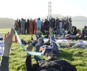On the eve of the Global Climate Action Summit,environmental advocates, youth, local community leaders and Indigenous people from around the world converged at Crissy Field, under the iconic Golden Gate bridge in San Francisco. Together, participants created a large-scale aerial art image as they were immersed into an avant-garde musical journey. nnThe experience was meant to convey that honoring Indigenous Rights by Standing for Climate Justice is key to a truly 100% Renewable Energy Future.