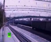 A motorway bridge has collapsed on top of the Trans-Siberian Railway in the Russian Far East, just as a truck was driving on the bridge and a train had passed underneath it.