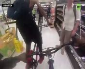 Teens wrestle elderly lady, punch man as gang tears through UK supermarket riding bikes