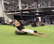 This guy rolled onto a fitness ball and got into a handstand at the gym. Then, he fell back onto the fitness ball and stood back up to perform a funny little dance.&#60;br/&#62;&#60;br/&#62;“The underlying music rights are not available for license. For use of the video with the track(s) contained therein, please contact the music publisher(s) or relevant rightsholder(s).”