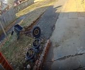 Josh shared a hilarious doorbell video featuring his wife&#39;s epic battle with a rogue spare tire during her innocent yardwork escapade. &#60;br/&#62;&#60;br/&#62;The woman goes from a state of confusion to that of panic as she watches the tire gleefully evade her attempts at containment.&#60;br/&#62;&#60;br/&#62;With the determination of a marathon runner chasing after the finish line, she sprints after the runaway rubber. However, the task at hand proves to be anything but easy as the rebellious tire hits the street. &#60;br/&#62;&#60;br/&#62;The comical footage comes to a close with both the lady and the rolling tire out of the frame&#39;s bounds.&#60;br/&#62;&#60;br/&#62;Location: St. Joseph, USA&#60;br/&#62;WooGlobe Ref : WGA794560&#60;br/&#62;For licensing and to use this video, please email licensing@wooglobe.com