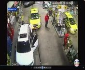 Surveillance video from Brazil’s Globo TV shows the swimmers at a gas station.