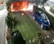 Dramaticfootage shows an ambulance explode into a fireball moments after an elderly patient is dropped off at home.