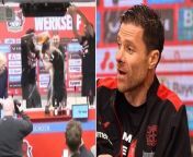 Bayer Leverkusen boss Xabi Alonso soaked in beer during press conferenceBayer Leverkusen