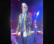 Brincos Dieras breaks the bouquet of flowers of an adult film actress during his show