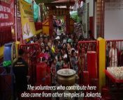 Hundreds of Indonesian Muslims gather at the Dharma Bakti temple in Jakarta to receive free food so they can break their fast during Ramadan. Sitting in a dense residential area of western Jakarta, the Buddhist temple prepares up to 450 packages of food and drinks.