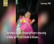 Amateur video shows officers rescuing a baby girl inside a house from the deadly Volcano de Fuego in Guatemala.