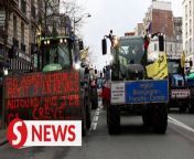 Farmers prepared to protest on Saturday (Feb 24) against President Emmanuel Macron&#39;s visit to a major Paris farm fair, amid anger over costs, red tape and green regulations.&#60;br/&#62;&#60;br/&#62;Dozens of tractors rolled into the French capital on Friday (Feb 23) afternoon, loudly honking their horns. One tractor carried a sign reading: &#92;