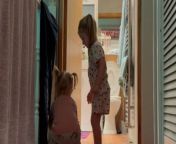 In an endearing display of sisterly teamwork, Brittany captures her two girls outside the bathroom, engaged in a mysterious mission. &#60;br/&#62;&#60;br/&#62;With curiosity piqued, Brittany quietly observes as the dynamic duo collaborates. The younger sister diligently fetches book after book while the elder ingeniously stacks them higher and higher.&#60;br/&#62;&#60;br/&#62;Finally, the elder sister scales the towering pile and successfully flicks off the bathroom light—a feat both simple and monumental.&#60;br/&#62;&#60;br/&#62;Meanwhile, undeterred by the task&#39;s completion, the younger sister continues to fetch books, unwilling to call it a day on the adorable display of teamwork. &#60;br/&#62;Location: Warwickshire, United Kingdom&#60;br/&#62;WooGlobe Ref : WGA216861&#60;br/&#62;For licensing and to use this video, please email licensing@wooglobe.com