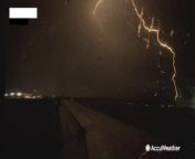Storm chaser Mike Scantlin captured these flashes of lightning at an airport in Tulsa, Oklahoma, in the early morning of March 7. Slow-motion video shows lightning illuminating the dark, stormy sky.