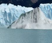 In this mesmerizing video, the bottom of a glacier pushes toward the surface of Lago Argentino lake in Patagonia, Santa Cruz. The sheer magnitude of the event is captured as ripples spread across the water, resembling the emergence of a colossal sea monster. The sight is nothing short of extraordinary, showcasing the raw power and majesty of nature. It&#39;s a breathtaking moment that highlights the dynamic and ever-changing landscapes of our planet. Viewers are treated to a spectacle that evokes awe and wonder, reminding us of the awe-inspiring forces at work in the natural world.&#60;br/&#62;Location: Los Glaciares National Park, Argentina &#60;br/&#62;WooGlobe Ref : WGA888538&#60;br/&#62;For licensing and to use this video, please email licensing@wooglobe.com