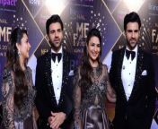 Yeh Hai Mohabbatein Couple Divyanka Tripathi &amp; Vivek Dahiya grace the grand red carpet of National Fame Awards-2024 event. The actors were spotted donning smart shiny formal outfits.