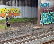 Three men were arrested alongside the train tracks at Port Kembla on Friday, April 5, 2024. Video by ACM