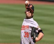 Corbin Burnes Leads Baltimore Orioles to Victory Over Red Sox from sexmex with mother in red